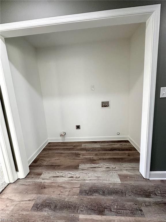 laundry area with hookup for a washing machine and dark wood-type flooring