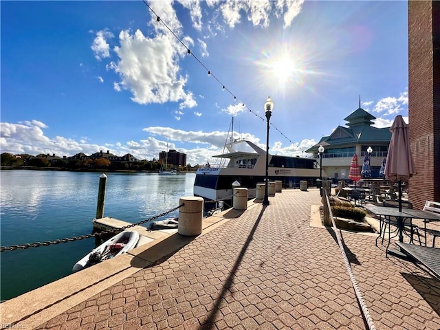 view of dock with a water view