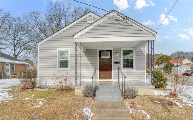 bungalow-style home featuring a porch