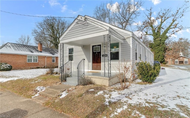 bungalow-style home featuring a porch