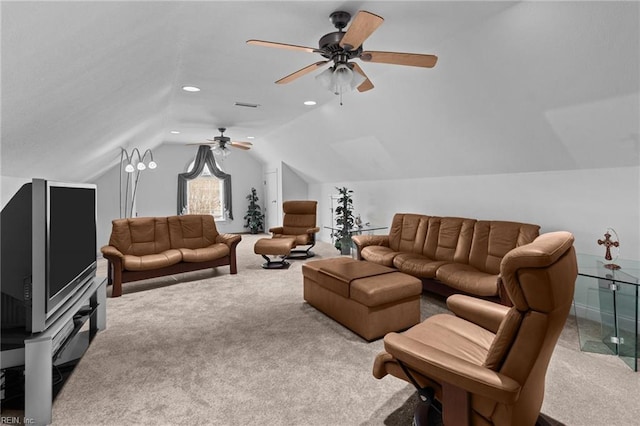 carpeted living room with vaulted ceiling