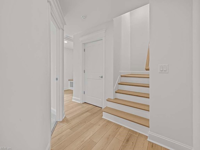 stairway featuring hardwood / wood-style floors