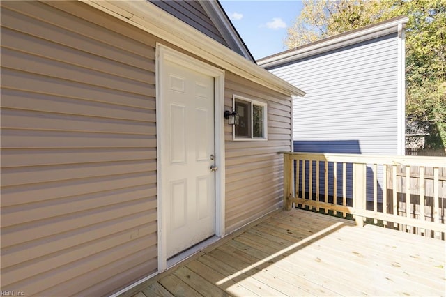 doorway to property with a deck