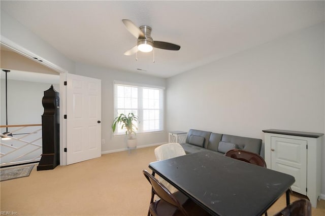 interior space featuring ceiling fan