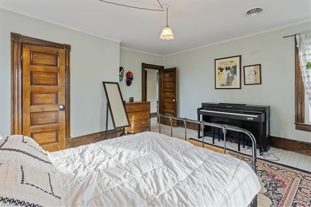 bedroom featuring crown molding