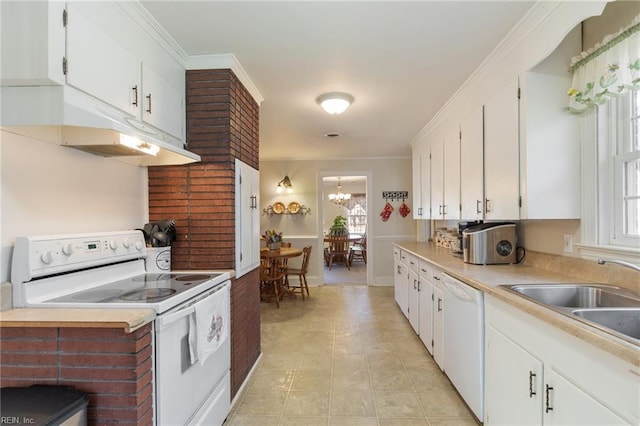 kitchen featuring sink, white appliances, a notable chandelier, ornamental molding, and white cabinets