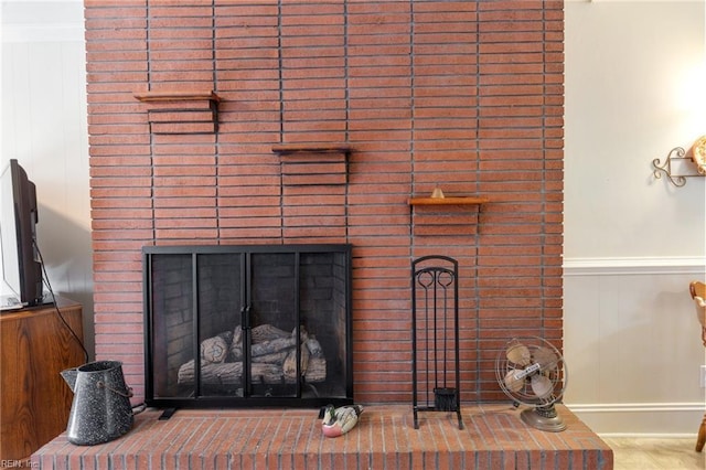 interior details featuring a fireplace