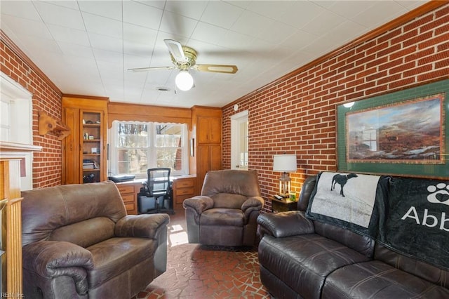 living room with brick wall and ceiling fan