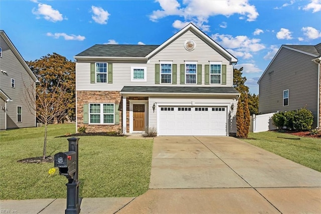 view of front facade featuring a garage and a front yard