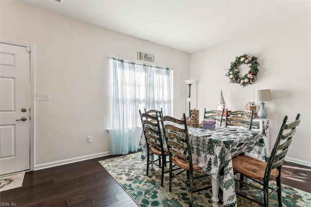 dining room featuring dark hardwood / wood-style floors