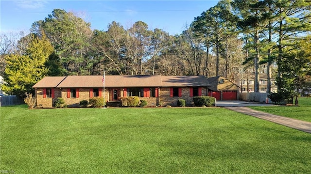 ranch-style home with a garage and a front lawn