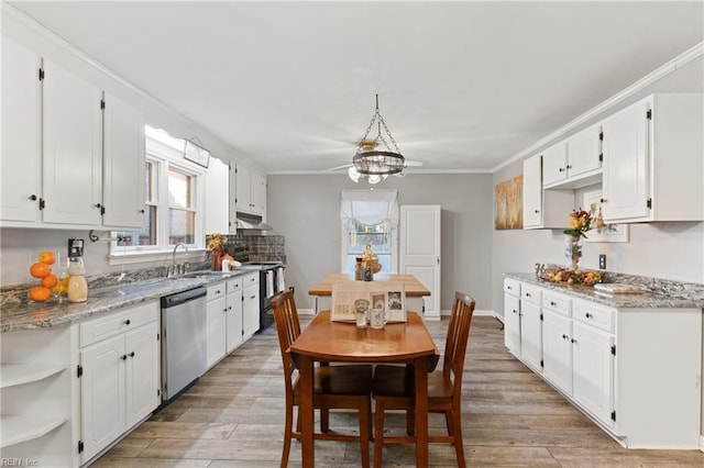 kitchen featuring sink, white cabinetry, light stone counters, dishwasher, and black range with electric stovetop