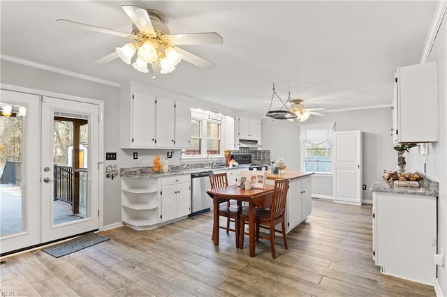 kitchen featuring crown molding, dishwasher, light hardwood / wood-style floors, and white cabinets