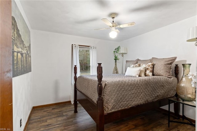 bedroom featuring ceiling fan and dark hardwood / wood-style floors