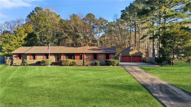 single story home featuring a garage and a front lawn