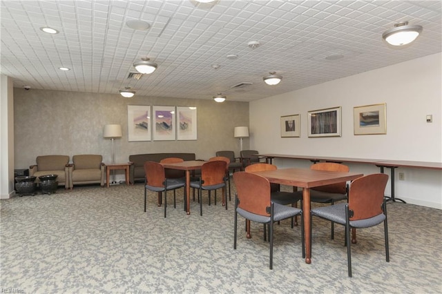 view of carpeted dining space