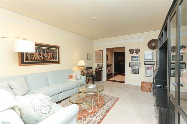 living room with ornamental molding and carpet flooring