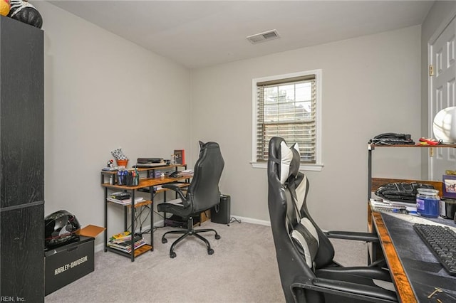 office area featuring light colored carpet