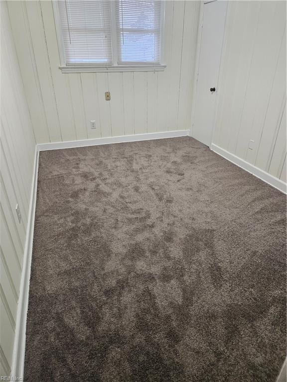 empty room featuring carpet flooring