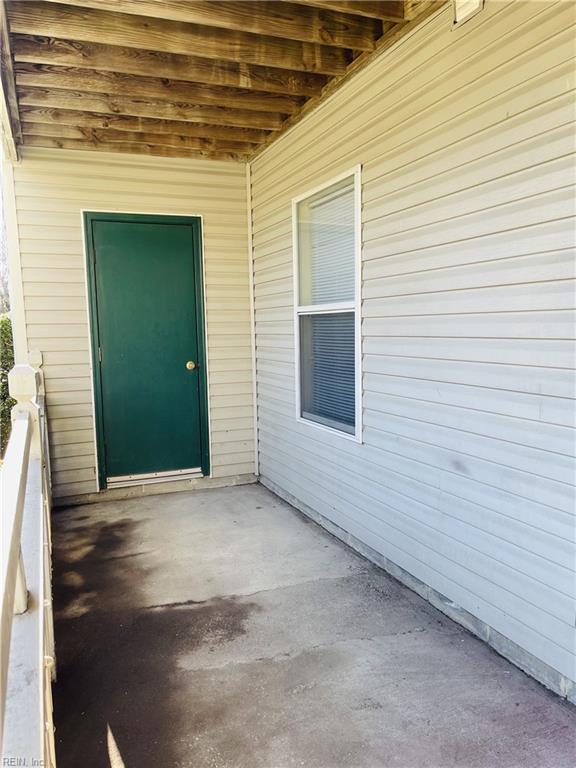 property entrance with a balcony