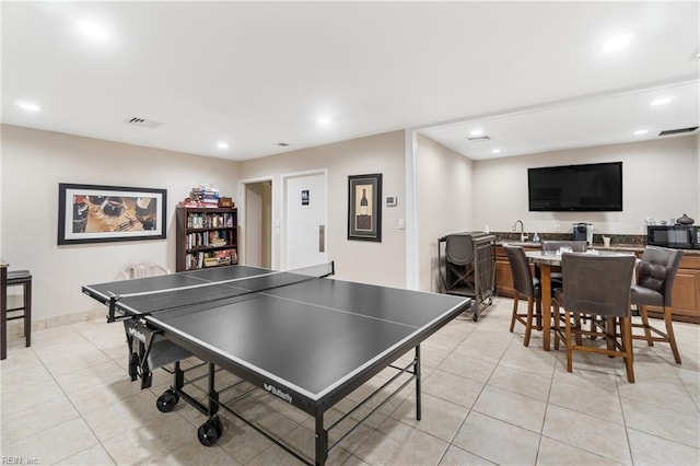 game room with light tile patterned floors