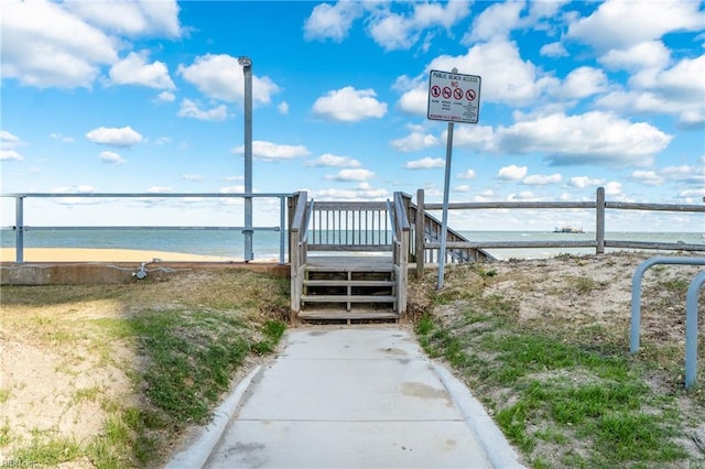 exterior space with a view of the beach and a water view