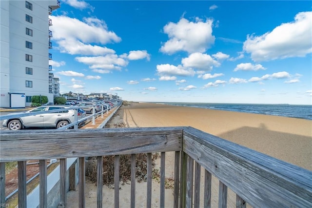 view of community featuring a water view and a view of the beach