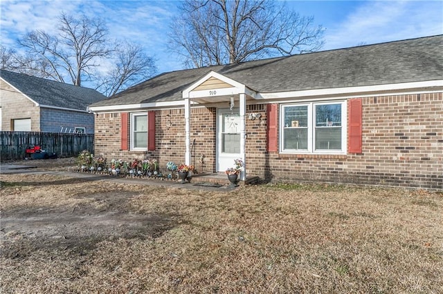 view of front of property with a front lawn