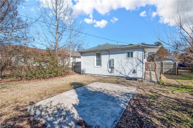 rear view of property with a patio