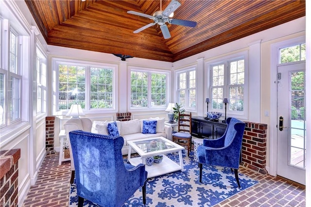 sunroom / solarium with wood ceiling and a tray ceiling