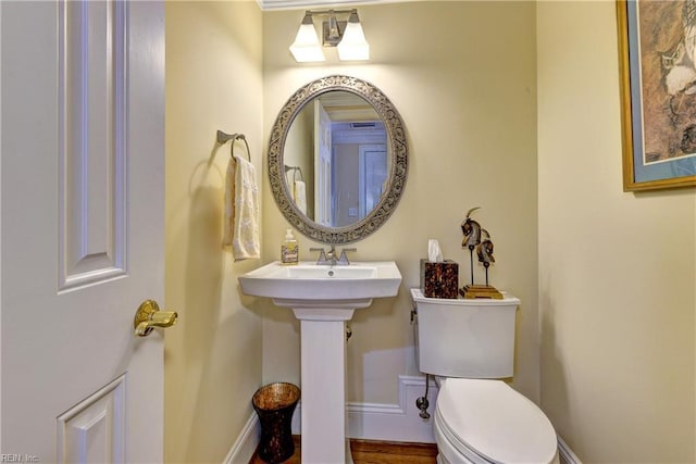 bathroom with sink and toilet