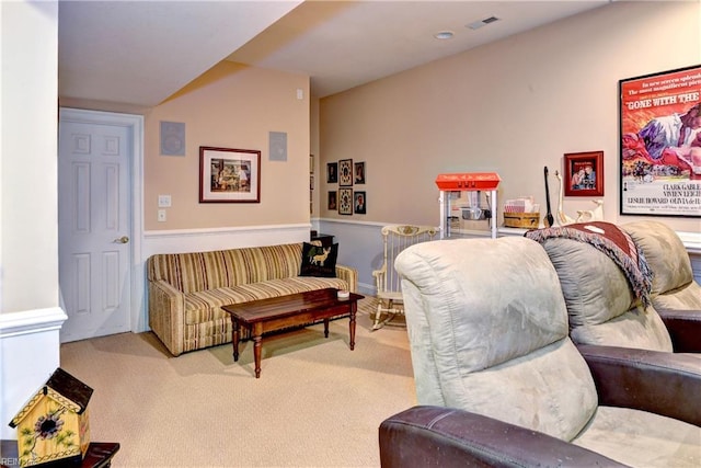 living room with light colored carpet