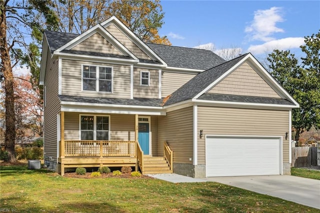 craftsman-style house with a porch, a front yard, driveway, and a garage