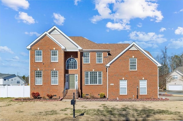 view of front of house with a front lawn