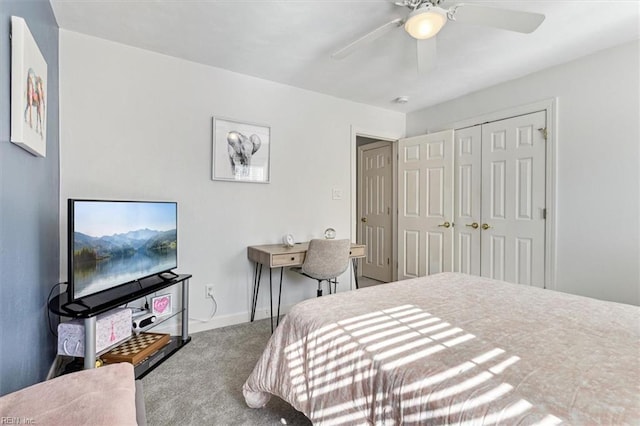 bedroom with carpet flooring, ceiling fan, and a closet