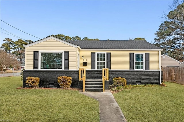 bungalow with a front yard