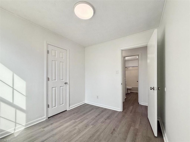 unfurnished bedroom featuring light hardwood / wood-style flooring