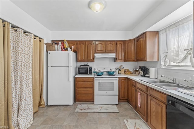 kitchen with sink and white appliances