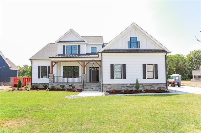 view of front of home featuring a porch and a front yard