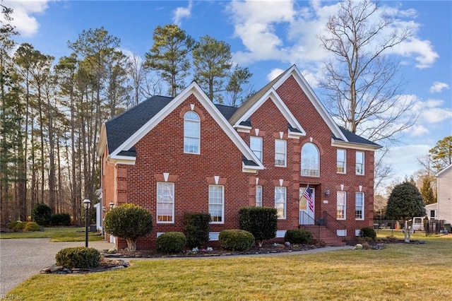 view of front of house with a front lawn