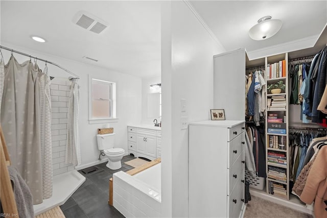 full bathroom with vanity, ornamental molding, shower with separate bathtub, and toilet