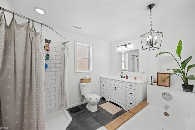 bathroom featuring vanity, a shower with shower curtain, tile patterned floors, and toilet