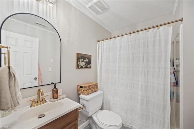 bathroom with vanity, toilet, and curtained shower