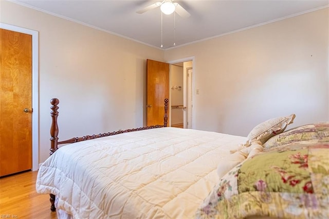 bedroom with ceiling fan, ornamental molding, and light hardwood / wood-style floors