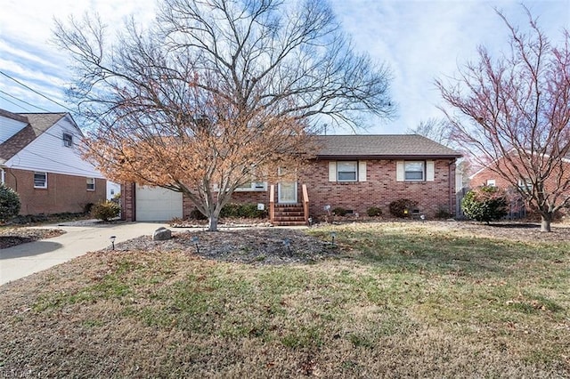 single story home with a garage and a front yard