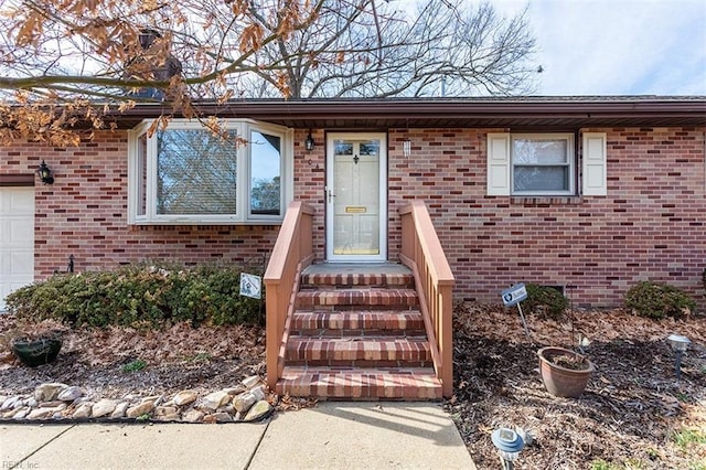 entrance to property with a garage