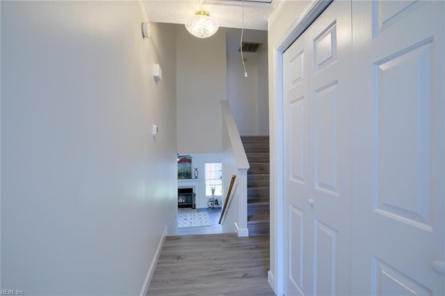 hall with light wood-type flooring