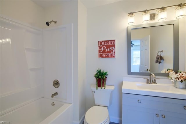 full bathroom with shower / bathing tub combination, vanity, and toilet