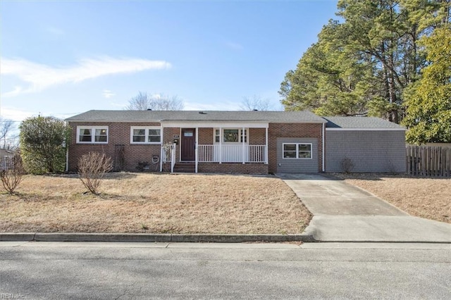 ranch-style home with covered porch