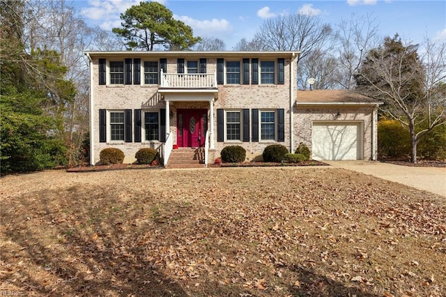 view of front of house with a balcony and a garage